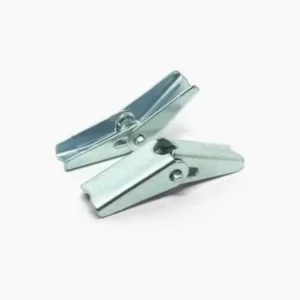 Pair of zinc plated steel clothespins on a white background