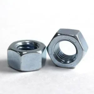 Pair of zinc plated hex nuts on a white surface